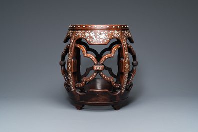 A Chinese mother-of-pearl-inlaid huali wooden drum-form stand or seat, Qing