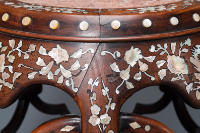 A Chinese mother-of-pearl-inlaid huali wooden drum-form stand or seat, Qing