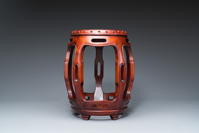 A Chinese wooden drum-form stand or seat, 19/20th C.