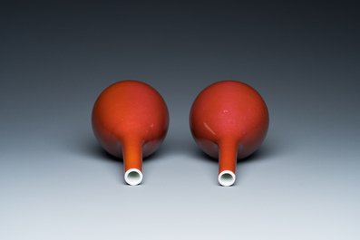 A pair of Chinese monochrome copper-red bottle vases, 19th C.