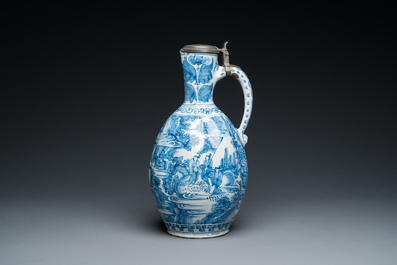 A large twisted Dutch Delft blue and white pewter-mounted ewer, 17th C.