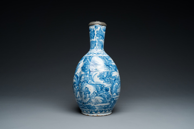 A large twisted Dutch Delft blue and white pewter-mounted ewer, 17th C.