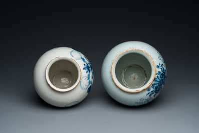 Two Dutch Delft blue and white tobacco jars with brass lids, 18th C.