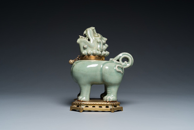 A Chinese gilt bronze-mounted Longquan celadon censer in the shape of a luduan, Ming