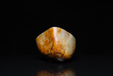 A Chinese hollowed jade libation cup on wooden stand, probably Qing