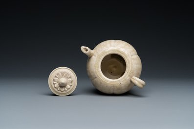 A Vietnamese beige-green-glazed melon-shaped ewer and cover, L&yacute;, 11/13th C.