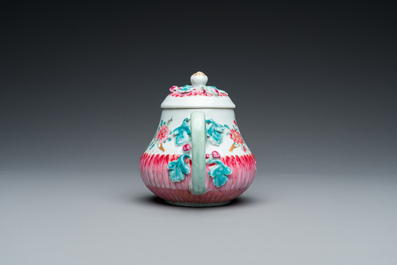 A Chinese famille rose 'lotus' teapot and cover, Yongzheng