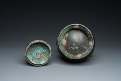 A Chinese ritual bronze 'hu' wine vessel and cover, Eastern Zhou or earlier