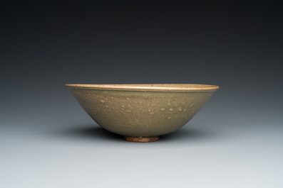 A Chinese Yaozhou celadon bowl with underglaze floral design, probably Ming