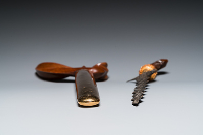 An Indonesian 'kris' or 'keris' dagger in polished Javanese wood with gilt copper and precious stones, 19th C.