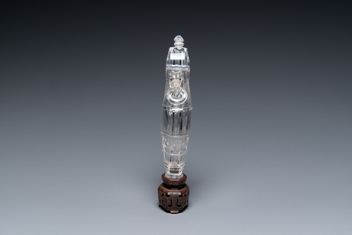 A Chinese rock crystal covered vase on wooden stand, 19/20th C.