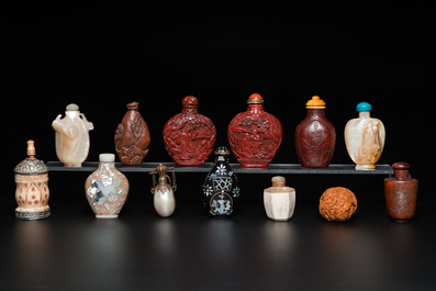 Thirteen Chinese wood, lacquer, mother-of-pearl and bone snuff bottles, 19/20th C.