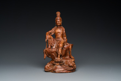 Een Chinese houten sculptuur van de zittende Tara, 19e eeuw