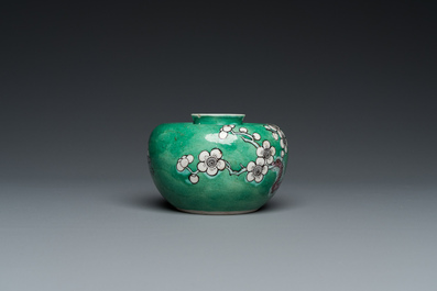 A Chinese verte biscuit 'prunus flowers' water pot, 19th C.