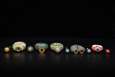 Eleven Chinese Canton enamel, cloisonn&eacute;, silver and other metal snuff bottles, 19/20th C.