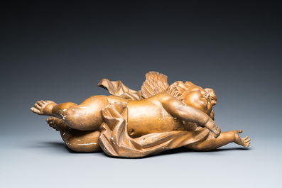 A pair of gilded wooden winged cherubs, probably Flanders, 1st half 18th C.