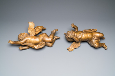 A pair of gilded wooden winged cherubs, probably Flanders, 1st half 18th C.