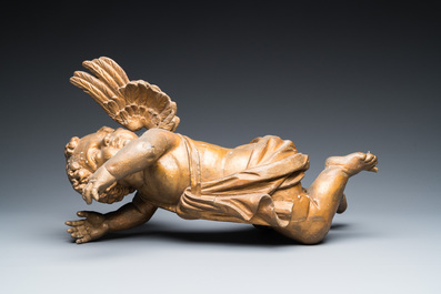 A pair of gilded wooden winged cherubs, probably Flanders, 1st half 18th C.