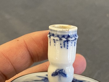 A pair of Chinese blue and white 'Bleu de Hue' candlesticks for the Vietnamese market, Kim Ngoc Cam Kee 金玉錦記 mark, 19th C.