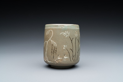 A Korean slip-decorated celadon-ground tea cup