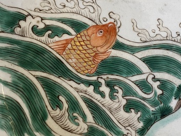 A Chinese famille verte dish with an emperor watching a carp, Kangxi