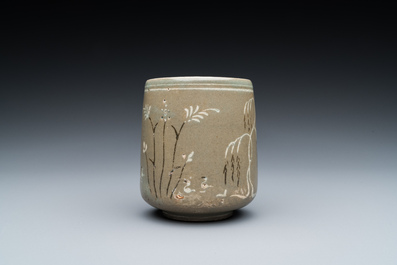 A Korean slip-decorated celadon-ground tea cup