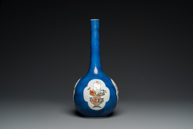 A Chinese famille verte powder-blue-ground bottle vase, Kangxi