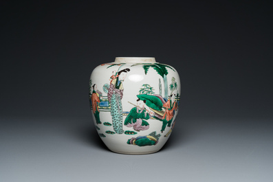 A Chinese famille verte jar with wooden cover and stand, 19th C.