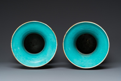 A pair of Chinese famille rose celadon-ground vases, 19th C.