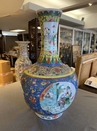 A Chinese famille verte bottle vase, Kangxi mark, 19/20th C.