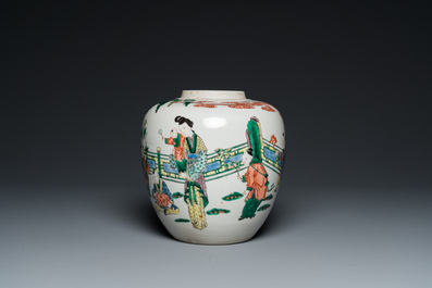 A Chinese famille verte jar with wooden cover and stand, 19th C.