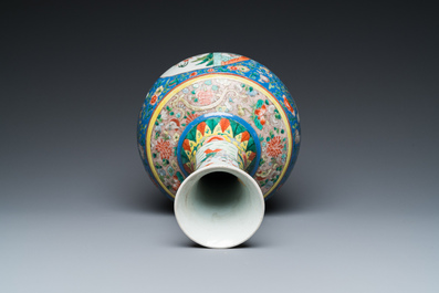 A Chinese famille verte bottle vase, Kangxi mark, 19/20th C.