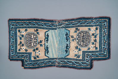 Two Chinese or Tibetan saddleback rugs, 19th C.
