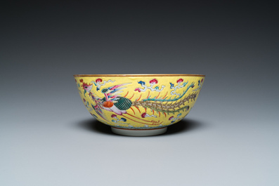 A Chinese yellow-ground famille rose 'dragon and phoenix' bowl, Xuantong mark and of the period