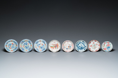 Eight Chinese blue and white, famille rose and verte saucers and six cups, Kangxi and later
