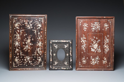 Two mother-of-pearl-inlaid wooden trays, two opium trays and an oval frame, China and/or Vietnam, 19th C.