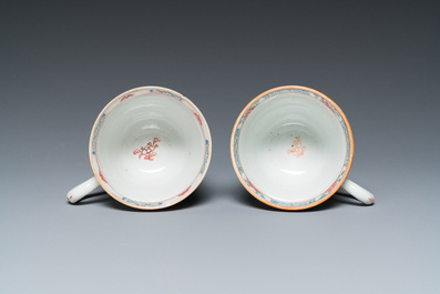 A pair of Chinese famille rose cups and saucers, Yongzheng