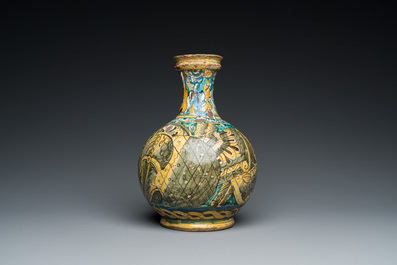 A polychrome Italian maiolica pharmacy bottle, 17th C.