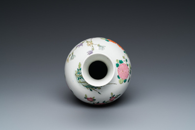 A Chinese famille rose vase with a bird among flowers, Yongzheng mark, 19th C.