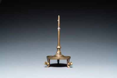 A Flemish or Dutch bronze candlestick, 14/15th C.