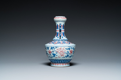 A Chinese blue, white and copper-red 'phoenix' vase, 19/20th C.