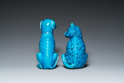 A Chinese turquoise-glazed cat and a dog on wooden stands, 19th C.