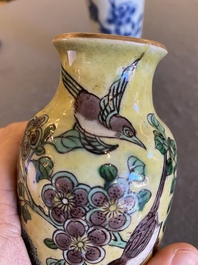 Two Chinese blue and white and famille jaune rouleau vases, Transitional period and 19th C.