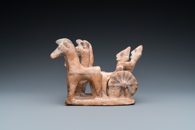 A painted terracotta horse carriage group, Cyprus, ca. 8th C. B.C.