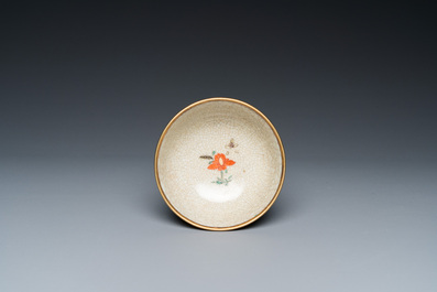 An unusual Chinese famille verte crackle-ground cup and saucer with gilt brass mounts, Kangxi