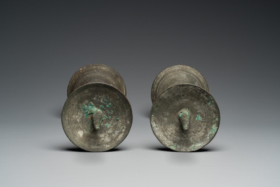 A pair of patinated bronze pricket candlesticks, France, 17th C.