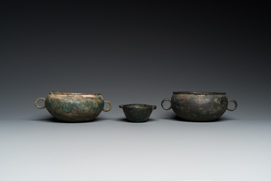 Three Chinese elliptical bronze cups, Eastern Zhou and Han