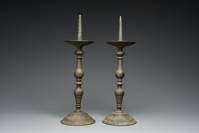 A pair of patinated bronze pricket candlesticks, France, 17th C.