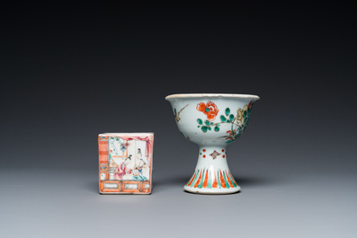 A Chinese famille verte stem cup, a famille rose 'mandarin' sander and a knife handle, Kangxi/Qianlong