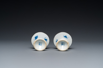 A pair of Chinese blue and white 'Bleu de Hue' candlesticks for the Vietnamese market, Kim Ngoc Cam Kee 金玉錦記 mark, 19th C.